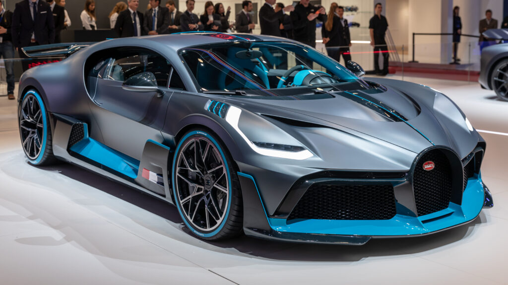 Divo hypercar, one of the top 10 most expensive cars in the world, with blue and black colors, aerodynamic design, and sharp spoilers.