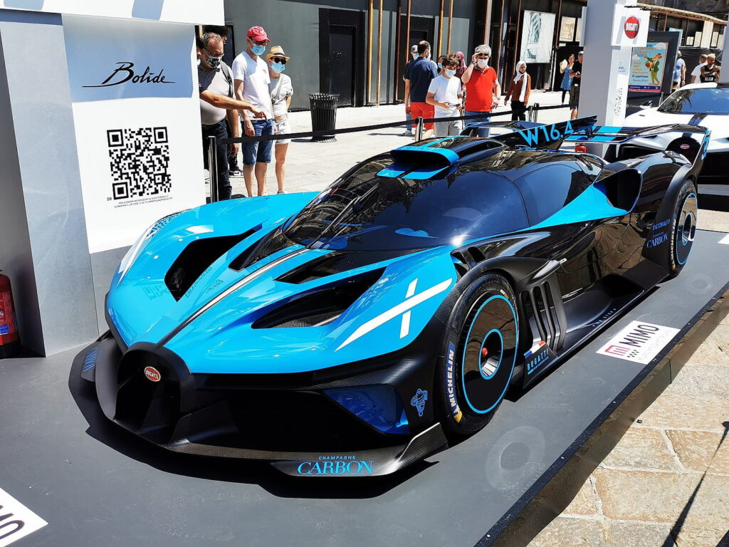 Bugatti Bolide hypercar, one of the top 10 most expensive cars in the world, with blue and black colors, aerodynamic design, and sharp spoilers.